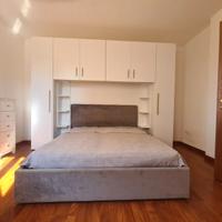 Letto matrimoniale con armadio a ponte