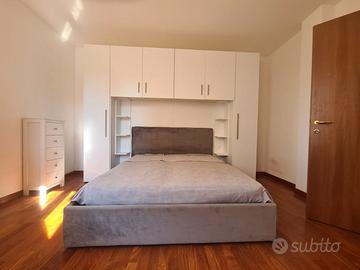 Letto matrimoniale con armadio a ponte