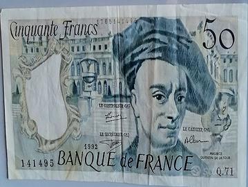 52)    12 banconote originali usate