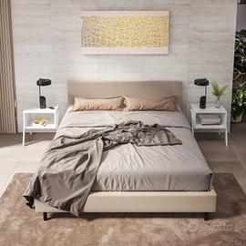 letto matrimoniale con testata imbottita