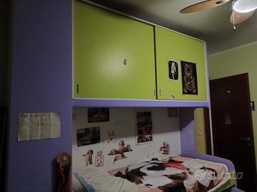 armadio a ponte con letto doppio