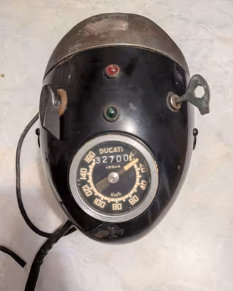 Faro moto epoca Aprilia D130 con conta km Ducati