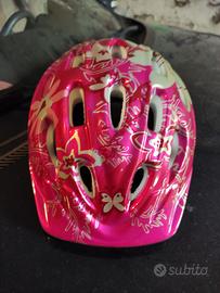 casco ragazza decathlon colore rosa scuro.