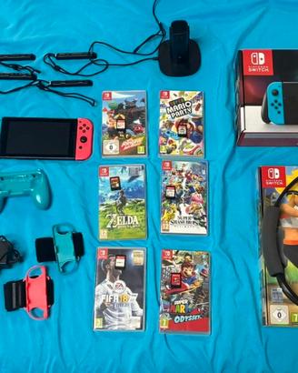 Nintendo Switch + 6 Giochi + Ring Fit Adventure