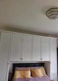 cameretta bianca con letto singolo 