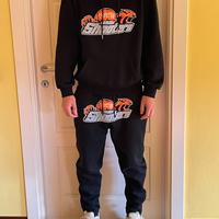 Tuta completa Trapstar nera azzurra e arancione