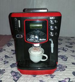 Macchina caffè e decorazione dolci