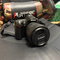 Nikon D90 + accesoro