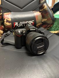 Nikon D90 + accesoro