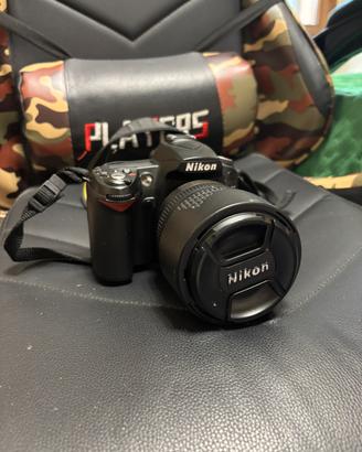 Nikon D90 + accesoro