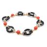 bracciale-in-oro-con-diamanti-corallo-e-onice