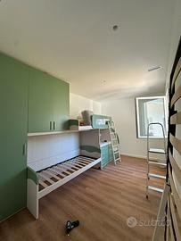 Cameretta con tre posti letto