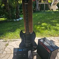 Chitarra elettrica con amplificatore e pedaliera e