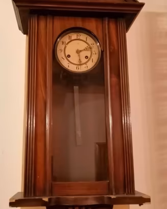 Orologio antico a pendolo