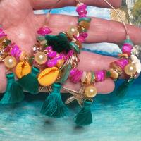 Orecchini grande di mate con pietre.