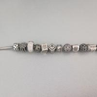 PANDORA_bracciale con charms e distanziatori