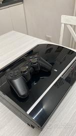 PS3 con cavo + joystick + 4 giochi per la play