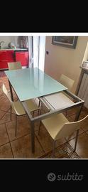 Tavolo in vetro temperato e acciaio satinato