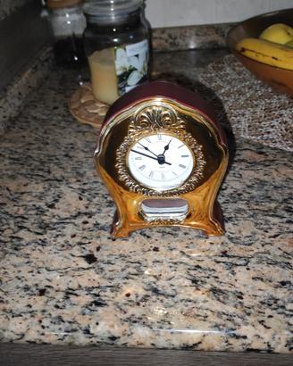 Orologio da tavolo in legno/ argento.