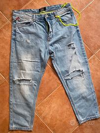 Jeans Alcott strappati con catena TG 48