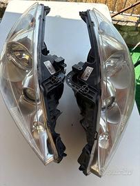 Proiettori dx/sx  con lente  Peugeot  207