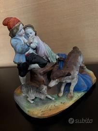 Pastorelli con cane e gatto in porcellana del ‘900