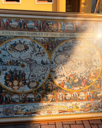 puzzle di planisfero antico inciso nel 1611