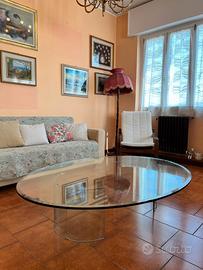 Tavolino ovale in cristallo temperato con base in