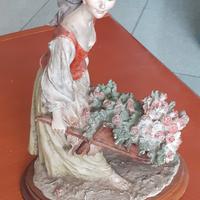 Statua Giuseppe Armani ragazza con carrettino