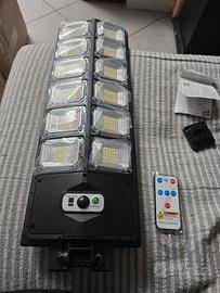 faro led a induzione luce solare