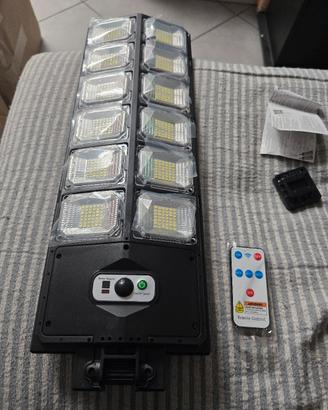 faro led a induzione luce solare