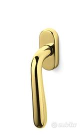 Maniglie Olivari per finestre color oro