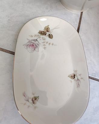 Servizio di piatti con perfilo in oro