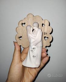 Soprammobile in legno e ceramica