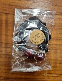 Elastico con ciondolo fatto a mano