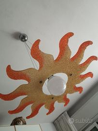 Lampadario a forma di sole