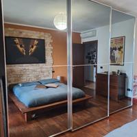 Armadio a specchio ante scorrevoli