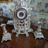 Orologio candelabri