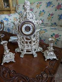 Orologio candelabri