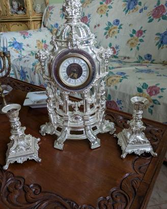 Orologio candelabri