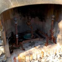 Coppia di alari in ferro battuto