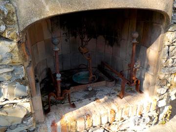 Coppia di alari in ferro battuto