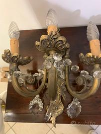 Coppia di applique vintage in bronzo e cristallo