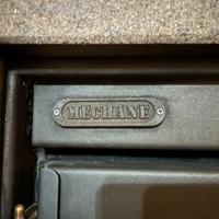 Camino mechane con rivestimento in peperino