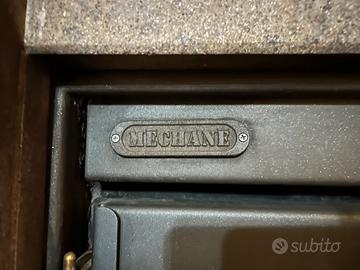 Camino mechane con rivestimento in peperino