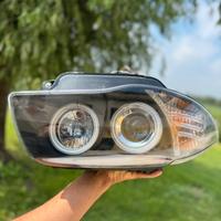 Fari Angel Eyes bmw serie 1 completo di lampadi le