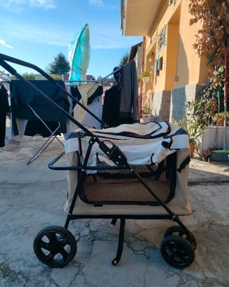 carrellino trasporta cane