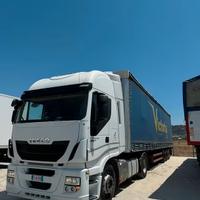 Iveco ecostralis + semirimorchio centinato