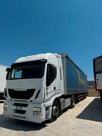 Iveco ecostralis + semirimorchio centinato