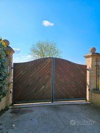 Cancello e' legno con ferro 3.5m